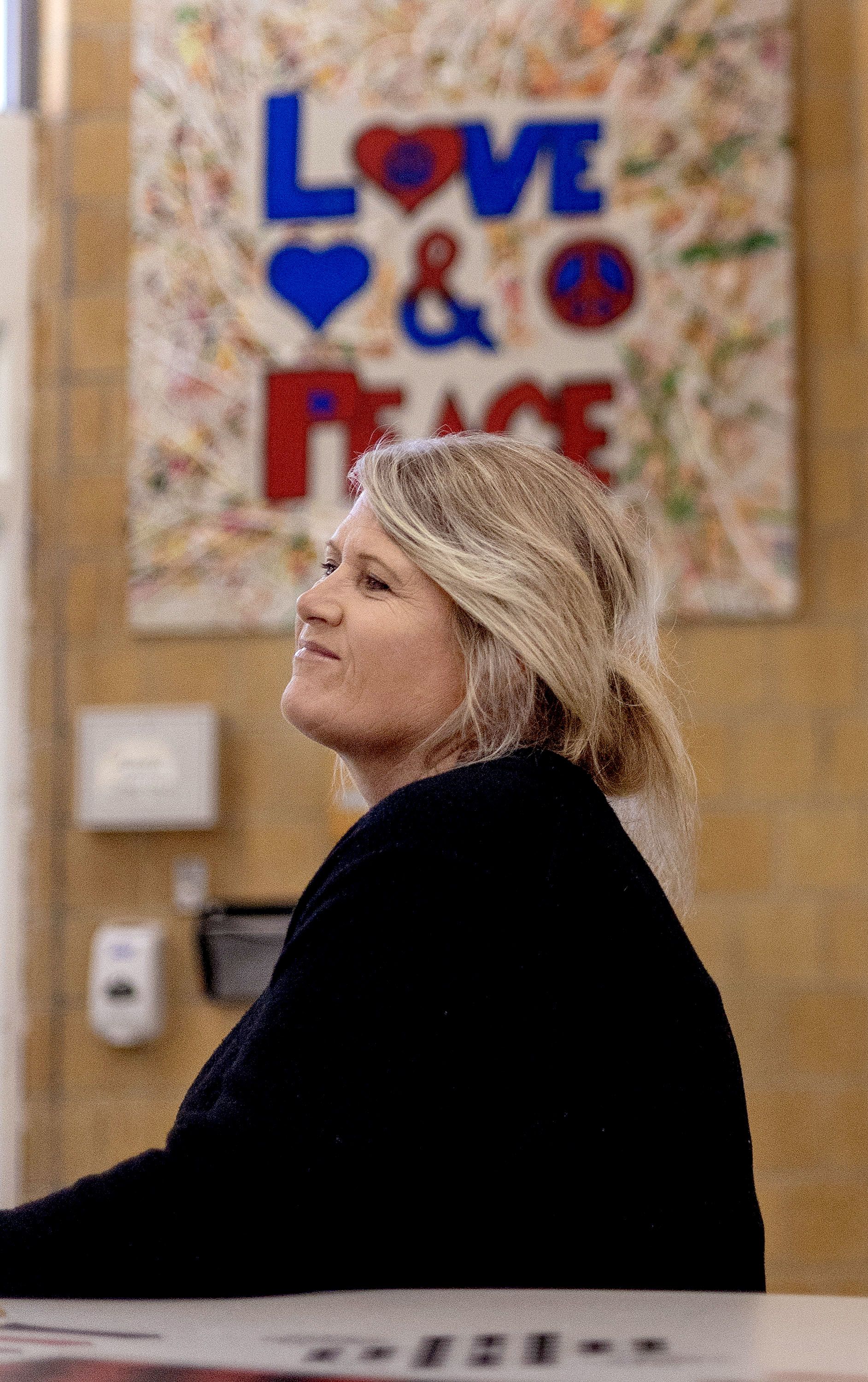 Sandy Rutledge, ADN, RN, CCHP, inside the community room at Decker Lake Youth Center. Sandy works in Juvenile Justice & Youth Services facilities as a nurse with University of Utah Health.