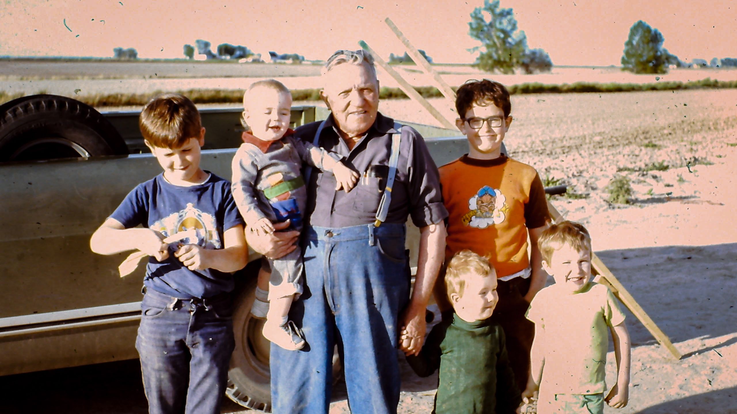Richard Bennett as a young child with four of his siblings and dungerees-wearing uncle Jim