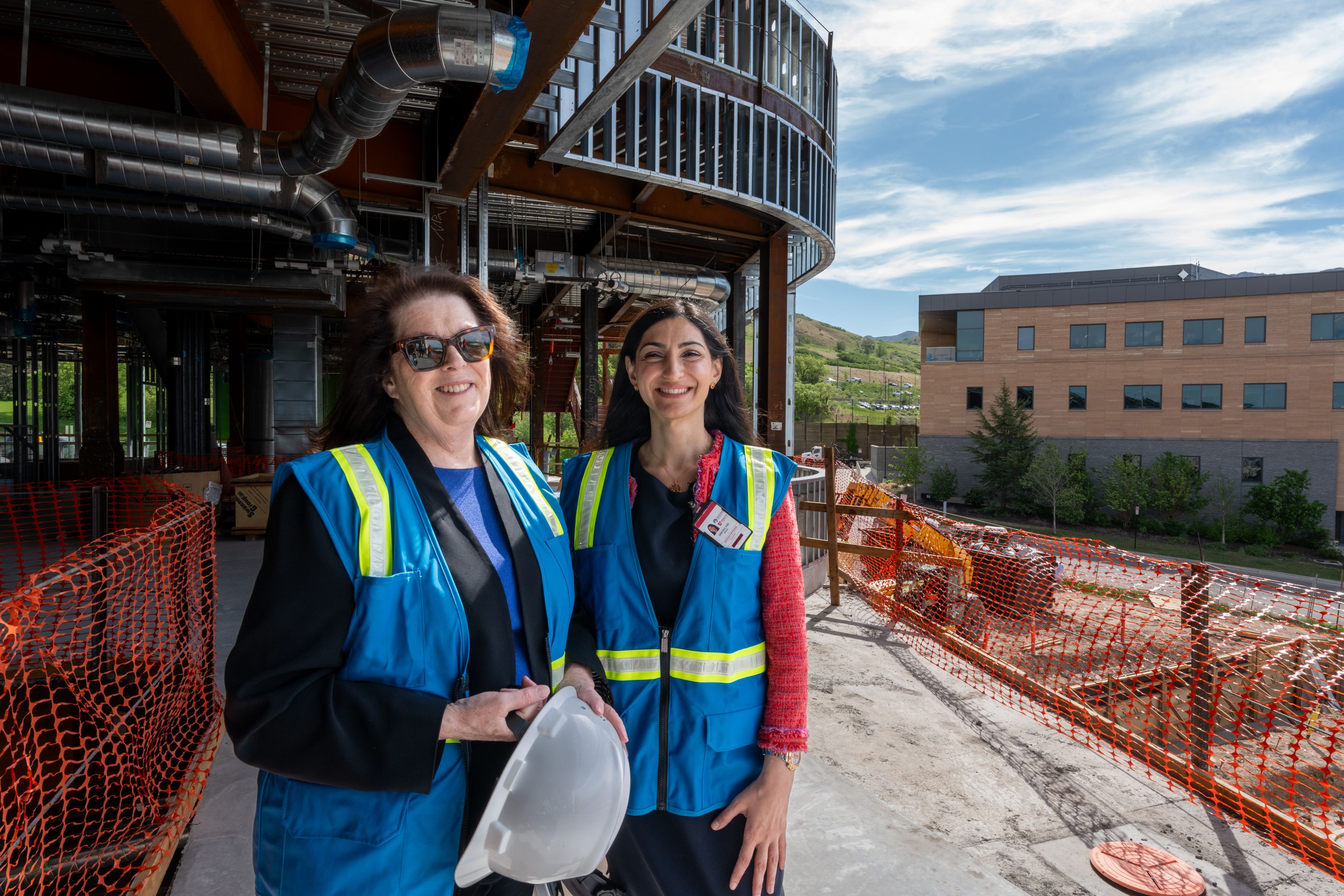 Research psychiatrists Deborah Yurgelun-Todd and Rana Jawish tour the Translational Research Building construction site for the first time. 
