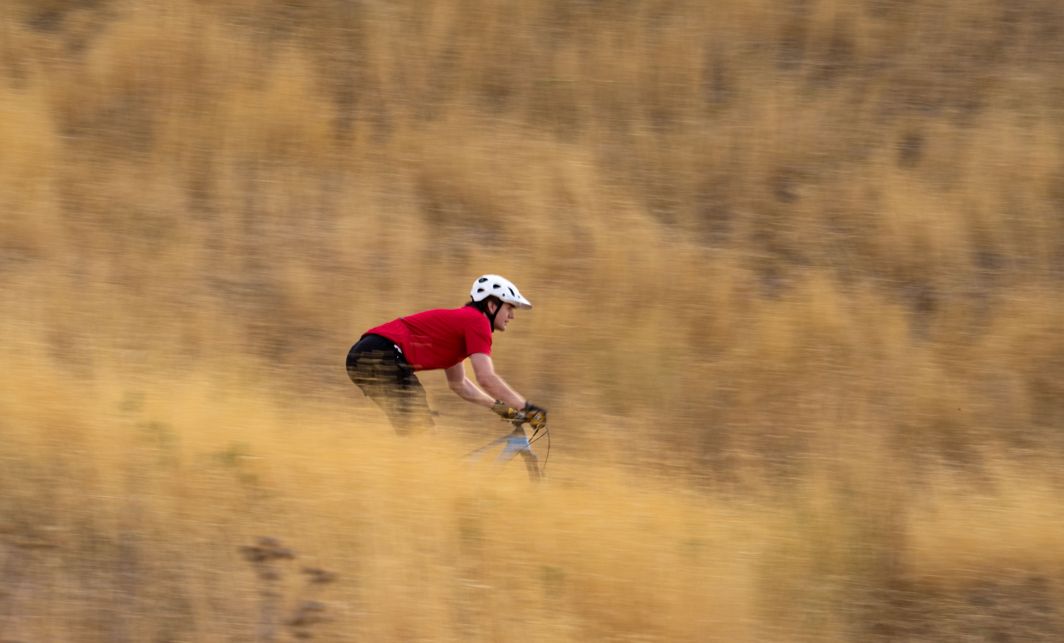 Clinical trial participant riding a bike 