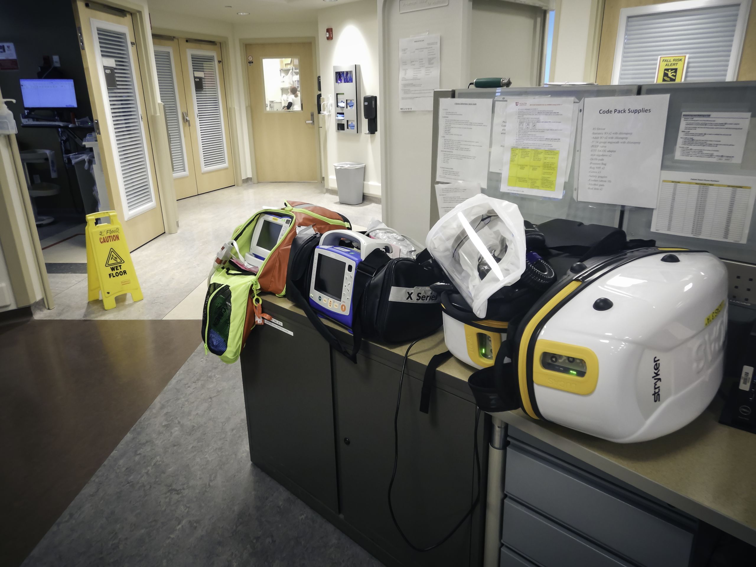 PAPRs and other PPE for the COVID-19 unit sit atop a shelf in the MICU.